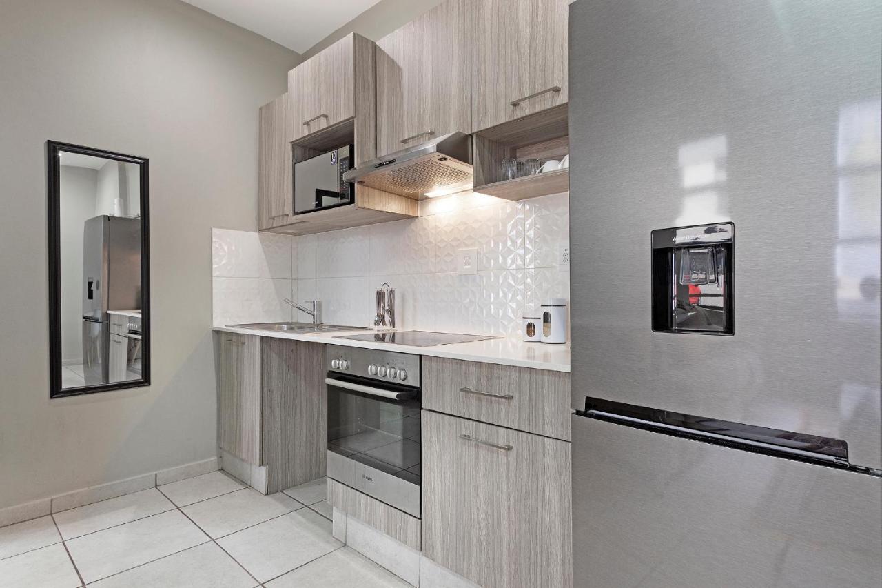 Urban Oasis Apartments At The Bolton ヨハネスブルグ エクステリア 写真