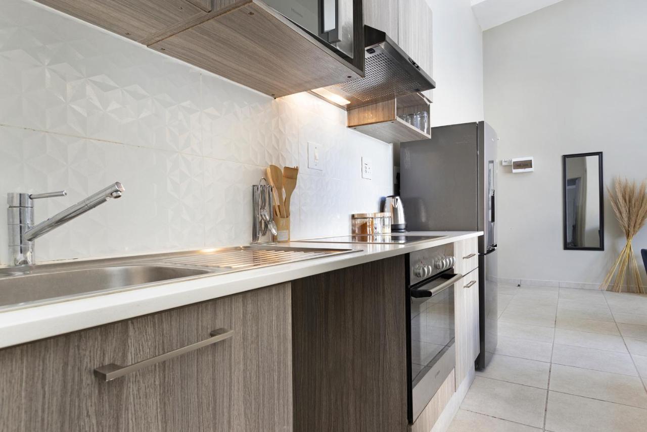 Urban Oasis Apartments At The Bolton ヨハネスブルグ エクステリア 写真