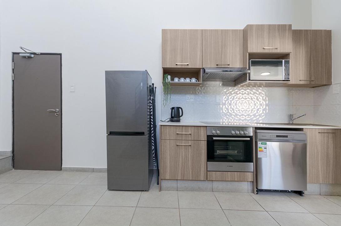 Urban Oasis Apartments At The Bolton ヨハネスブルグ エクステリア 写真